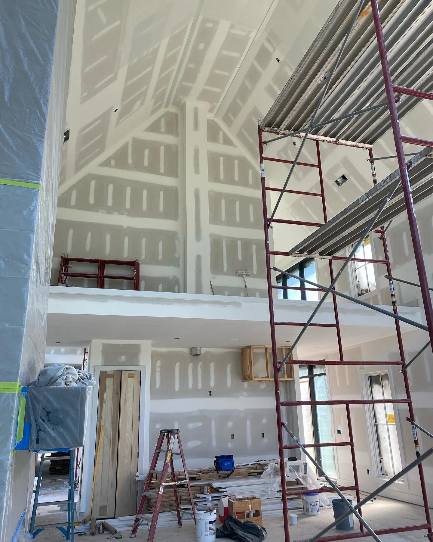 Large interior with drywall seams taped and floated